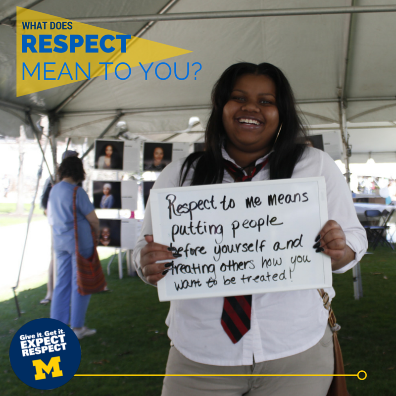 Photo with a person holding a whiteboard sign that says 'Respect to me means putting people before yourself and treating others how you want to be treated!'